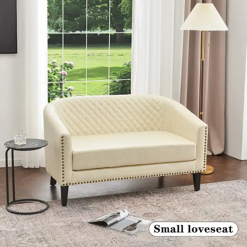 Causeuse touffetée en simili-cuir en forme de tonneau de 50" avec rivets en laiton