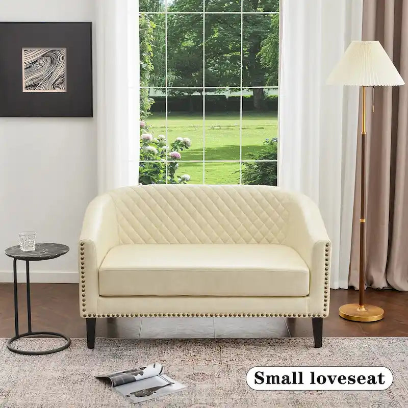 Causeuse touffetée en simili-cuir en forme de tonneau de 50" avec rivets en laiton